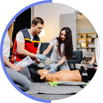 Participants receiving first aid training manuals at VIVICPR